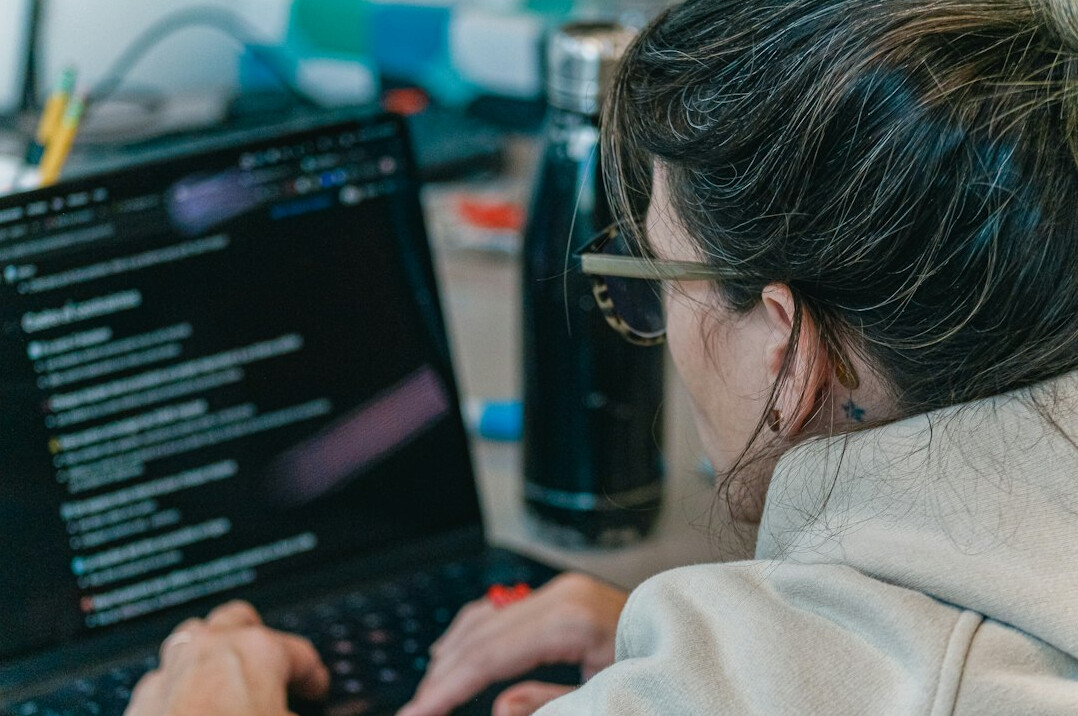young person excited about coding