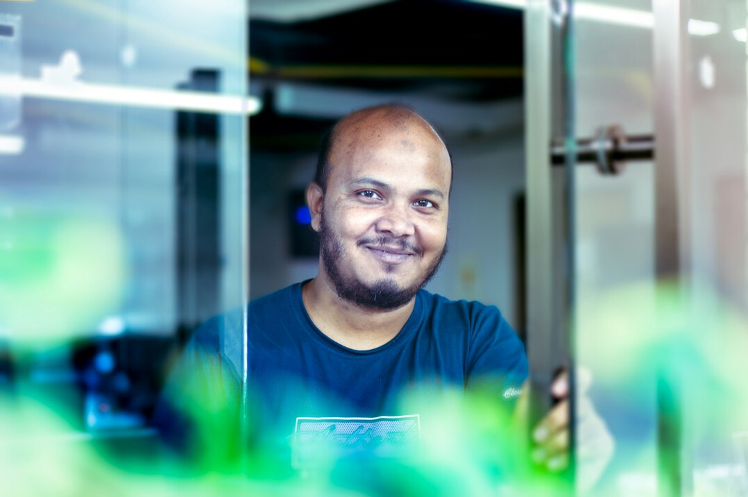 person celebrating success at computer