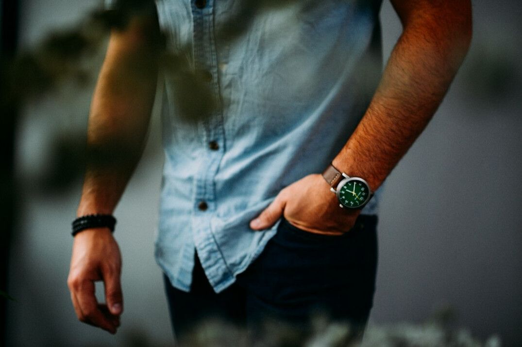 Studio portrait of a young Croatian man with a beard in a business casual shirt