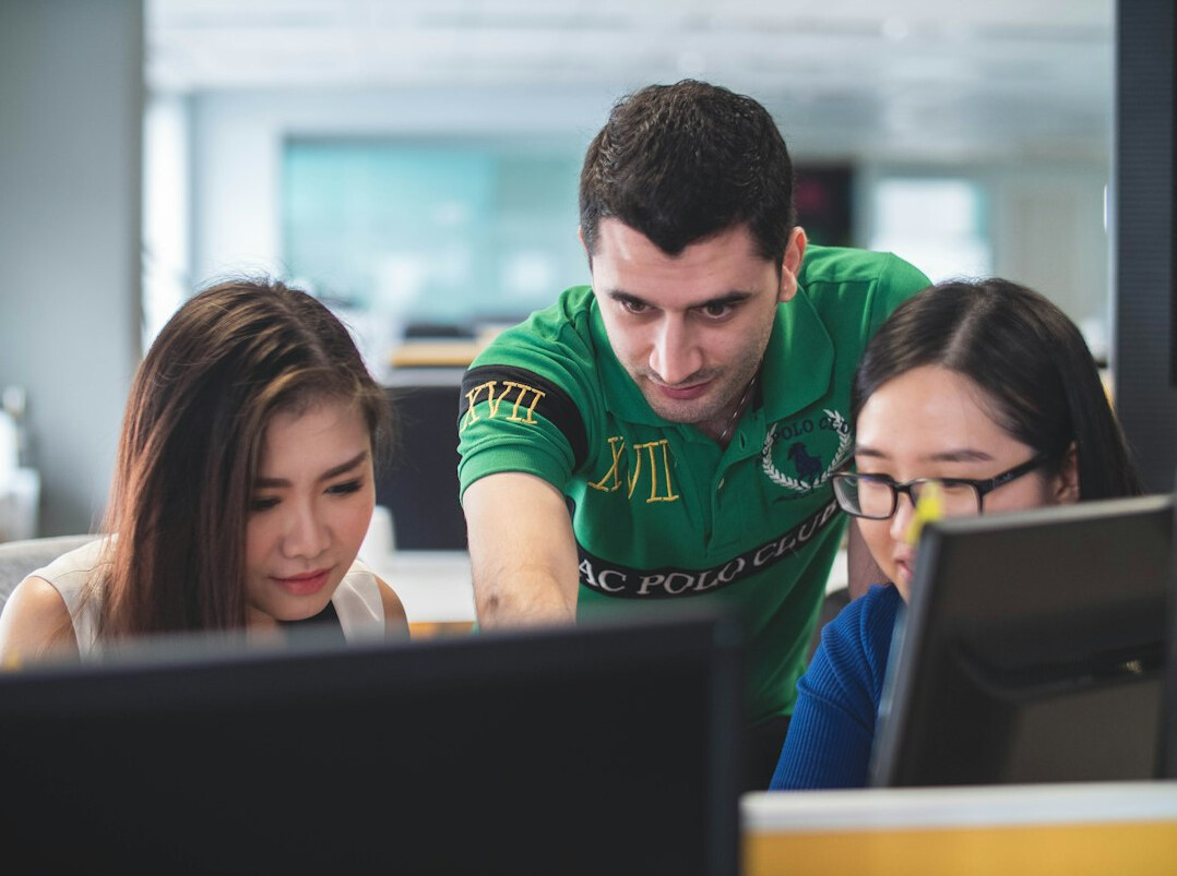 team discussing code